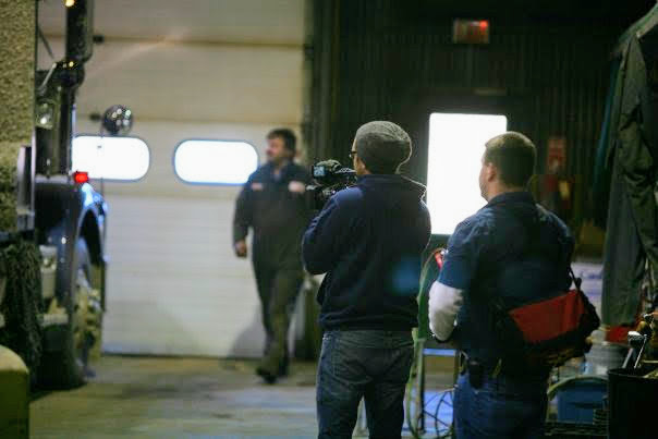 Shawn behind the camera taking notes on set, American Loggers Season 2, Millinocket, Maine